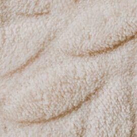 Close-up of a plush cream carpet pile
